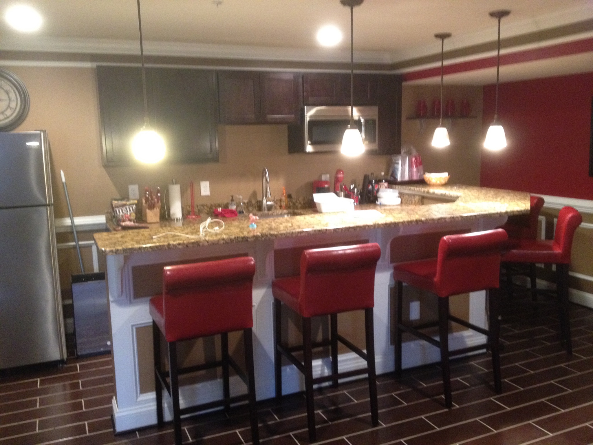 Basement home theater and kitchen entertainment space by Andre Horne