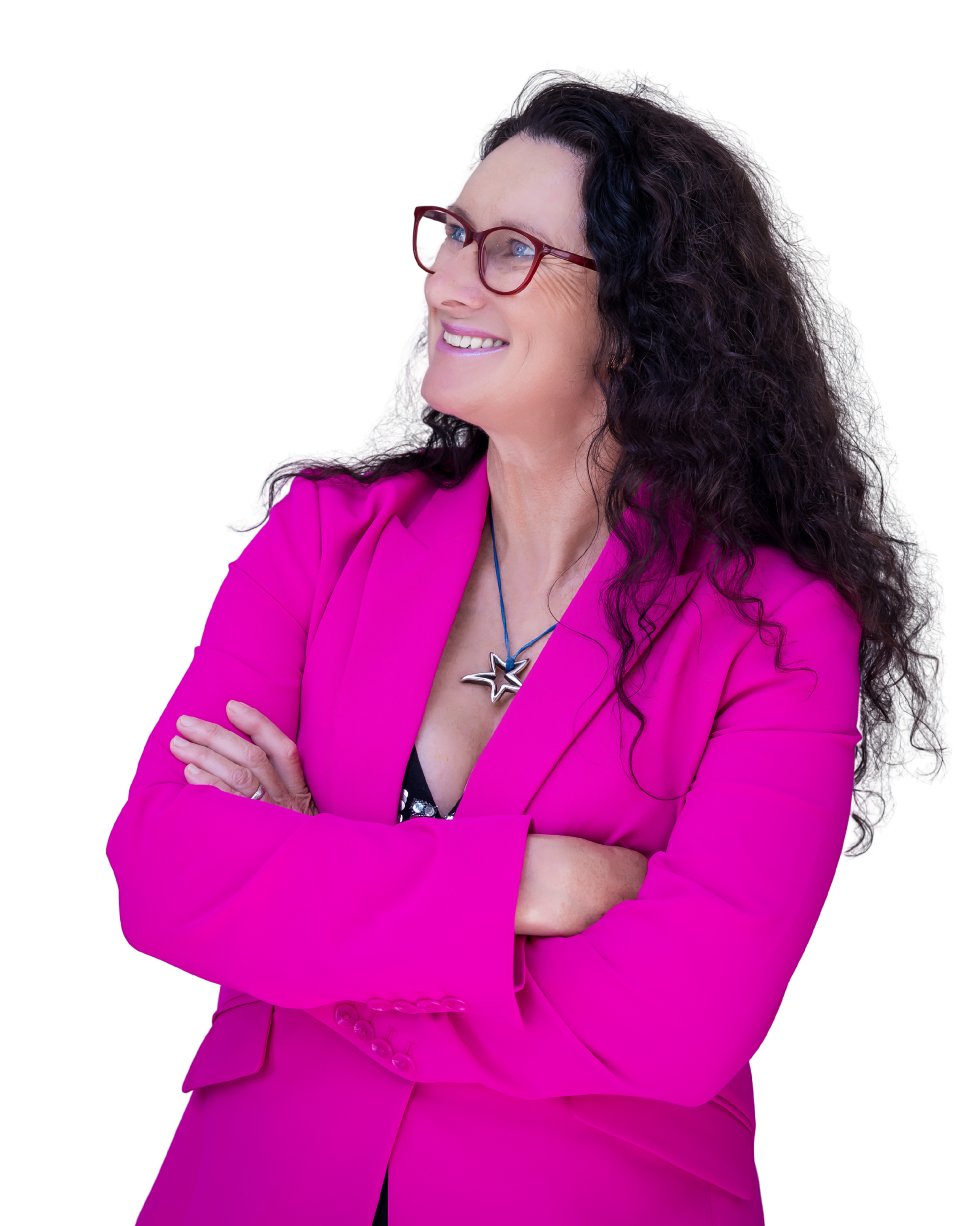 Jennie Milton, keynote speaker and extreme athlete, smiling in a pink blazer