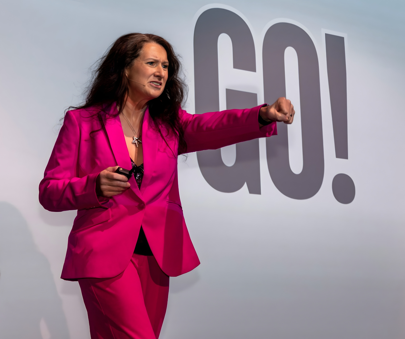 Jennie Milton engaging the audience during a keynote
