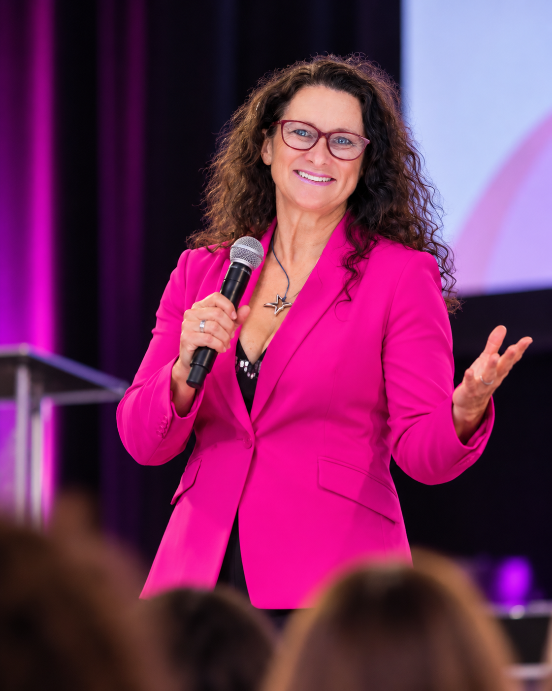 Keynote speaker Jennie AdrenaJen Milton on stage