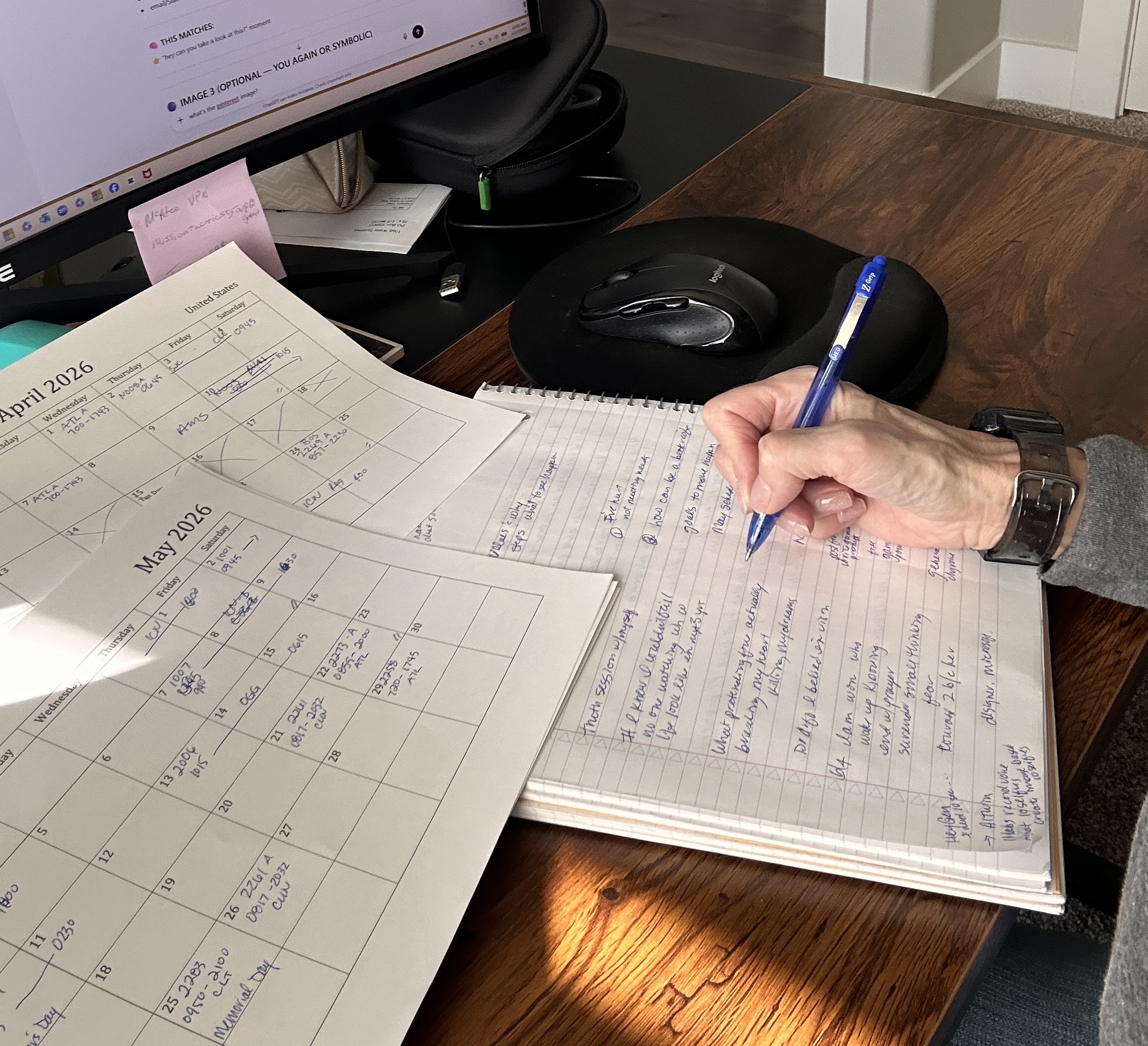 person juggling multiple projects on calendars