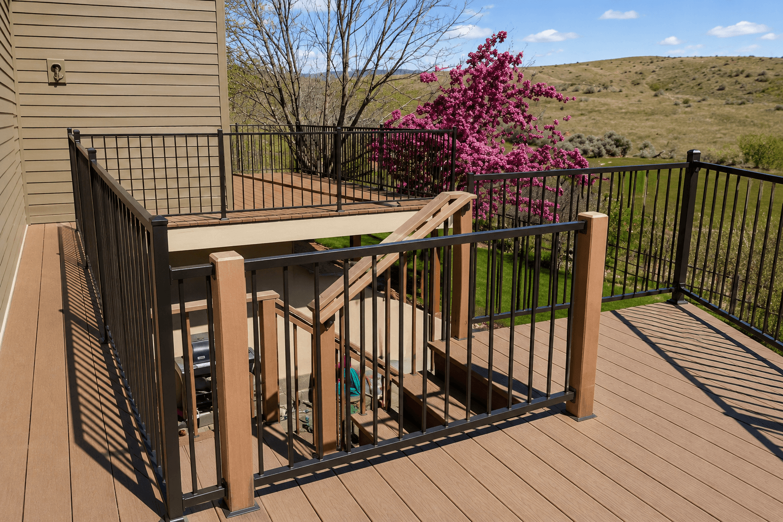 Custom balcony guard iron rail fabricated by Kodiak Gates & Iron.