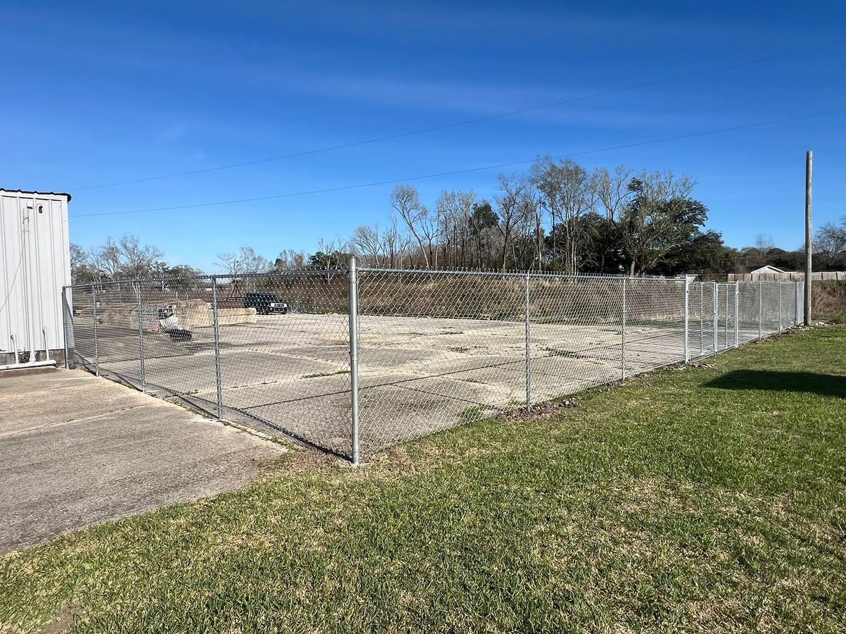 Chain link fence enclosing a commercial yard