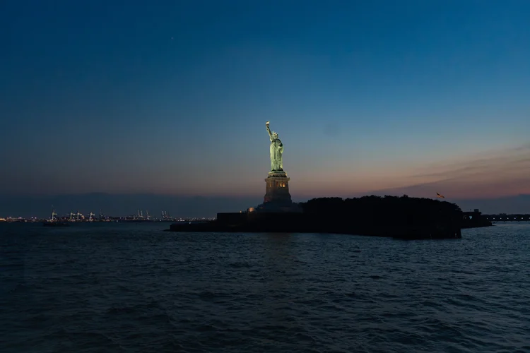 NYC party cruise crowd dancing with Manhattan skyline