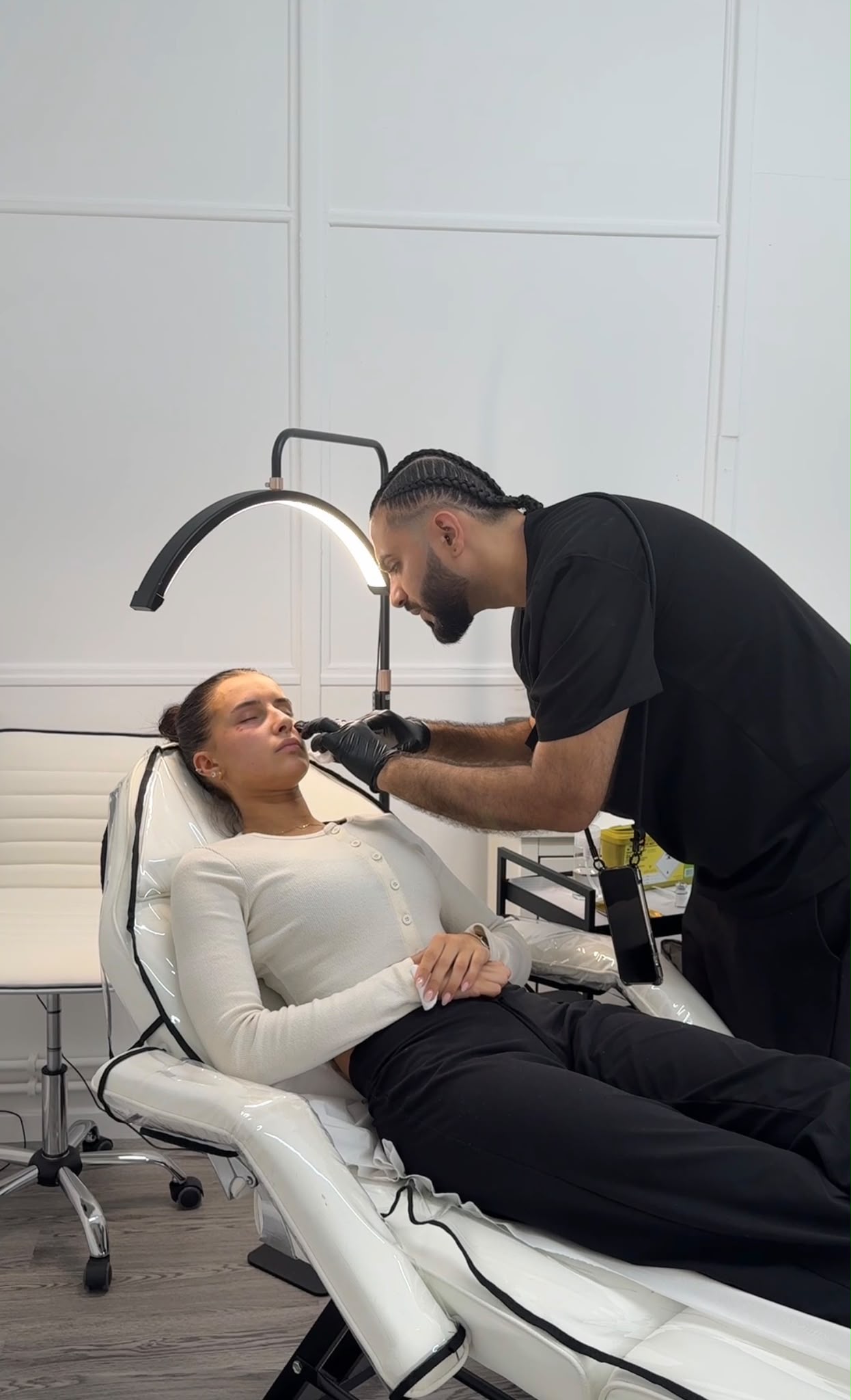 A client receiving a treatment at SR Aesthetics