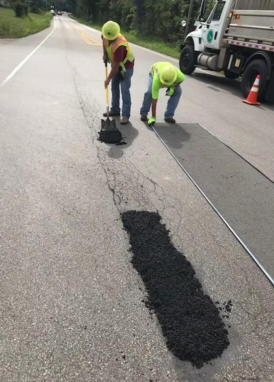 First the pothole was filled with conventional fill