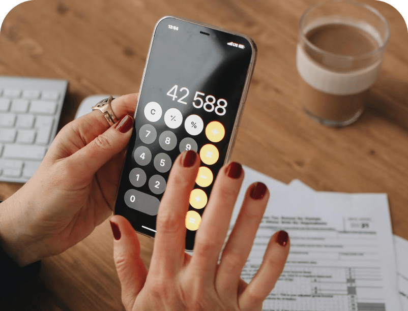 Person using calculator on their phone 