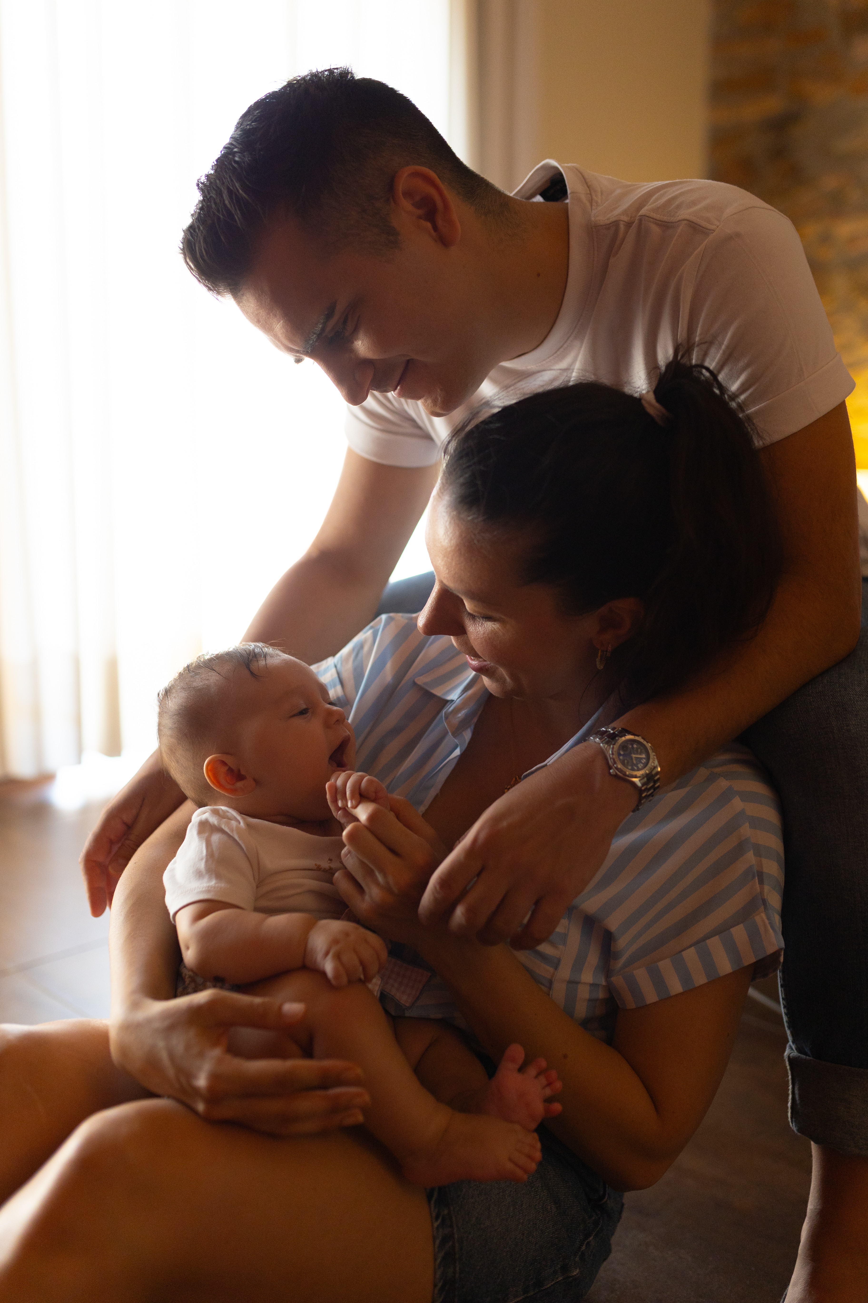 A unique shot of tube lights falling from the ceiling in a dark room.