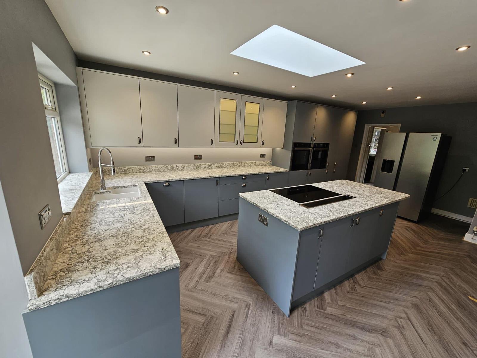 Open-plan kitchen and dining room with a bold splashback
