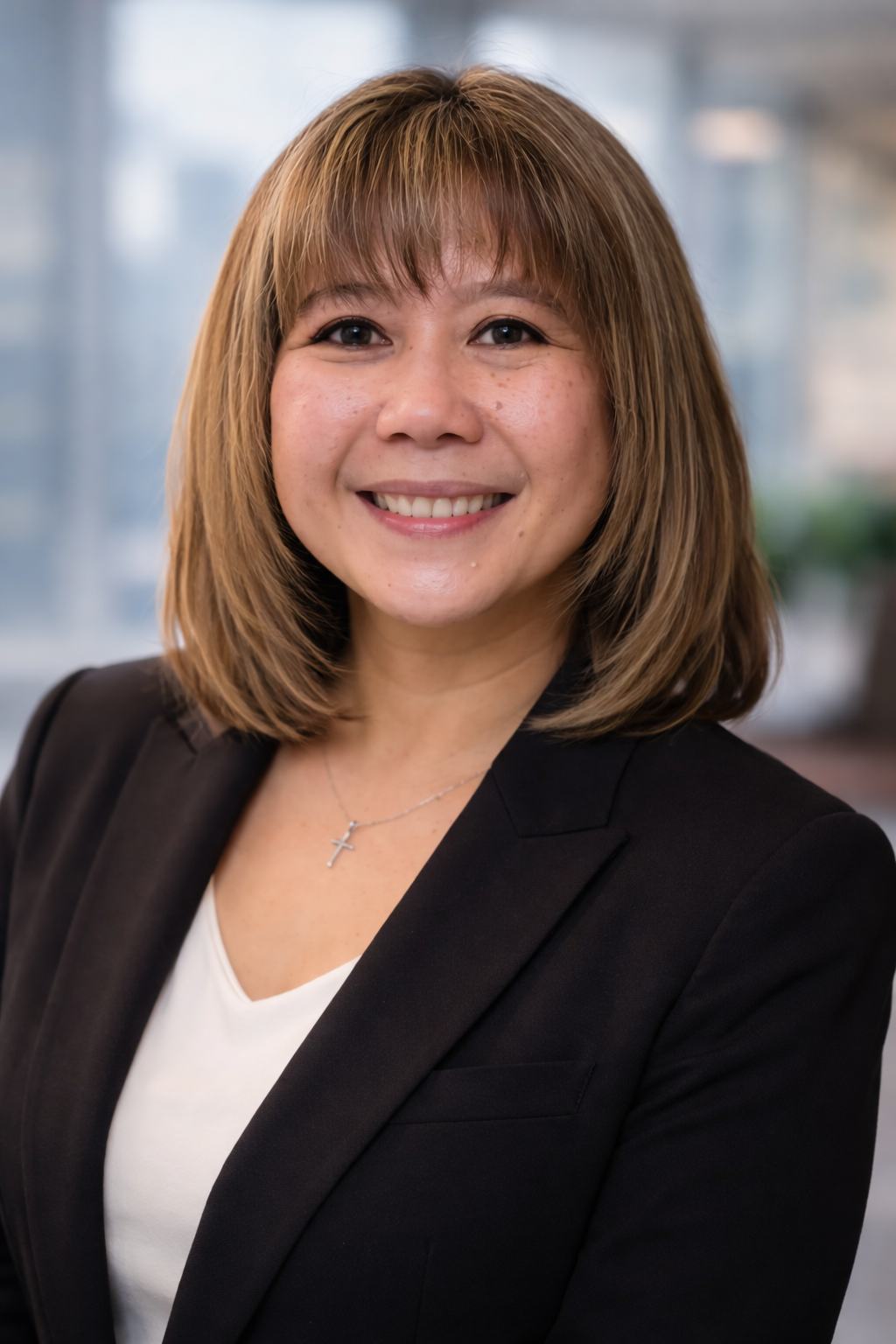 Professional headshot of Catherine Amparo