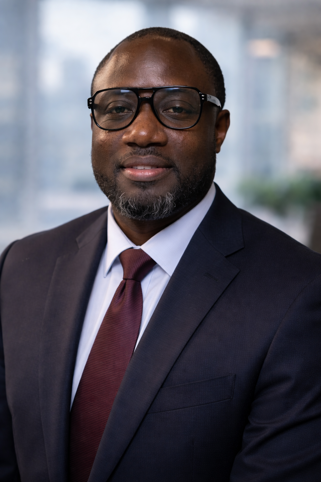 Professional headshot of Abdulah Paq Bah