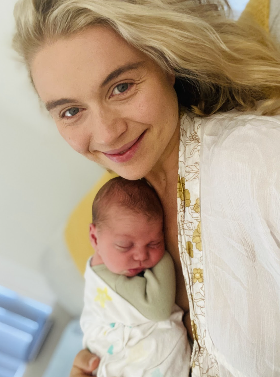 Hannah holding her newborn