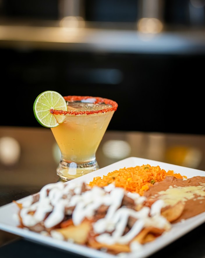 Cheese enchiladas topped with red sauce