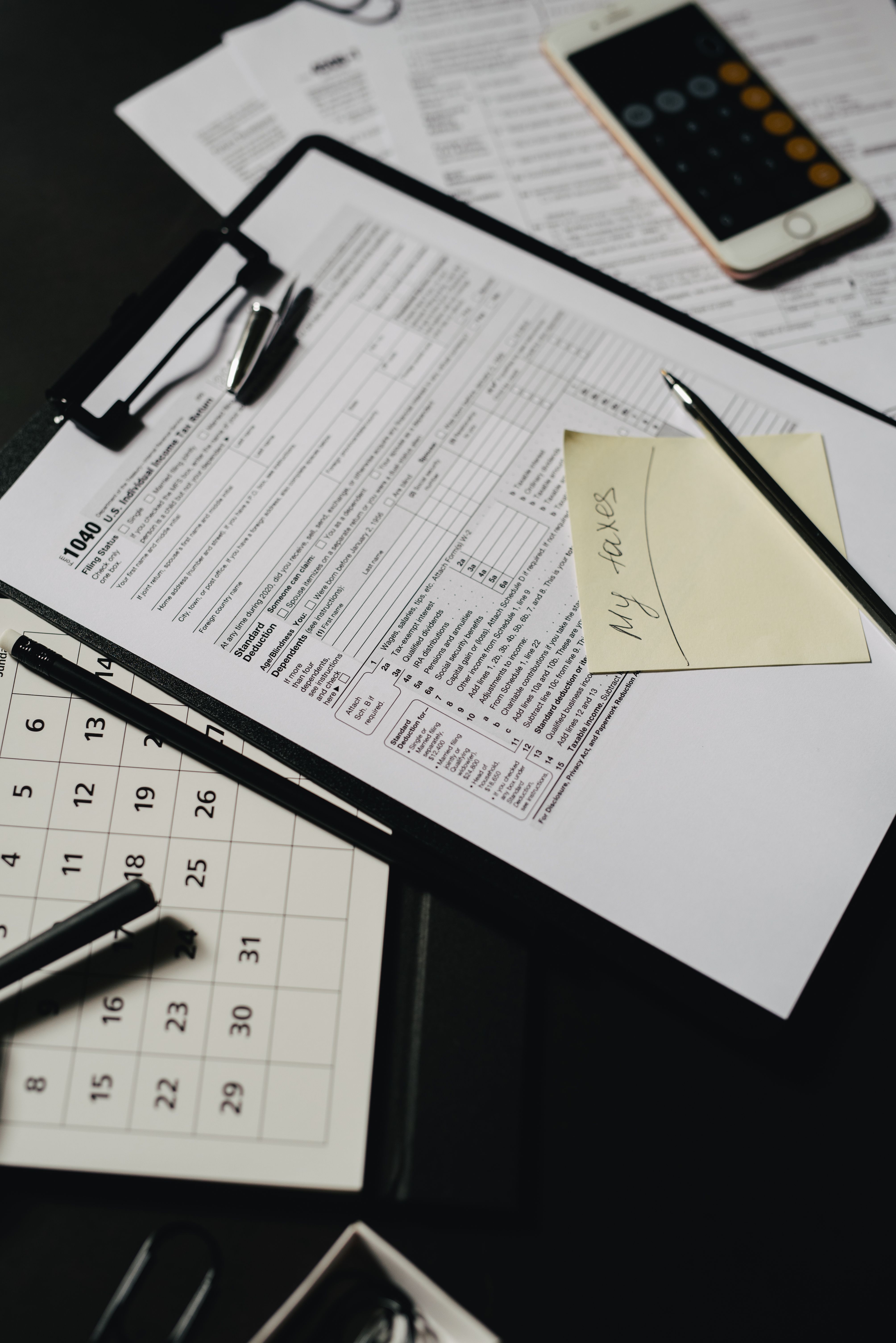 Tax preparation documents and calculator