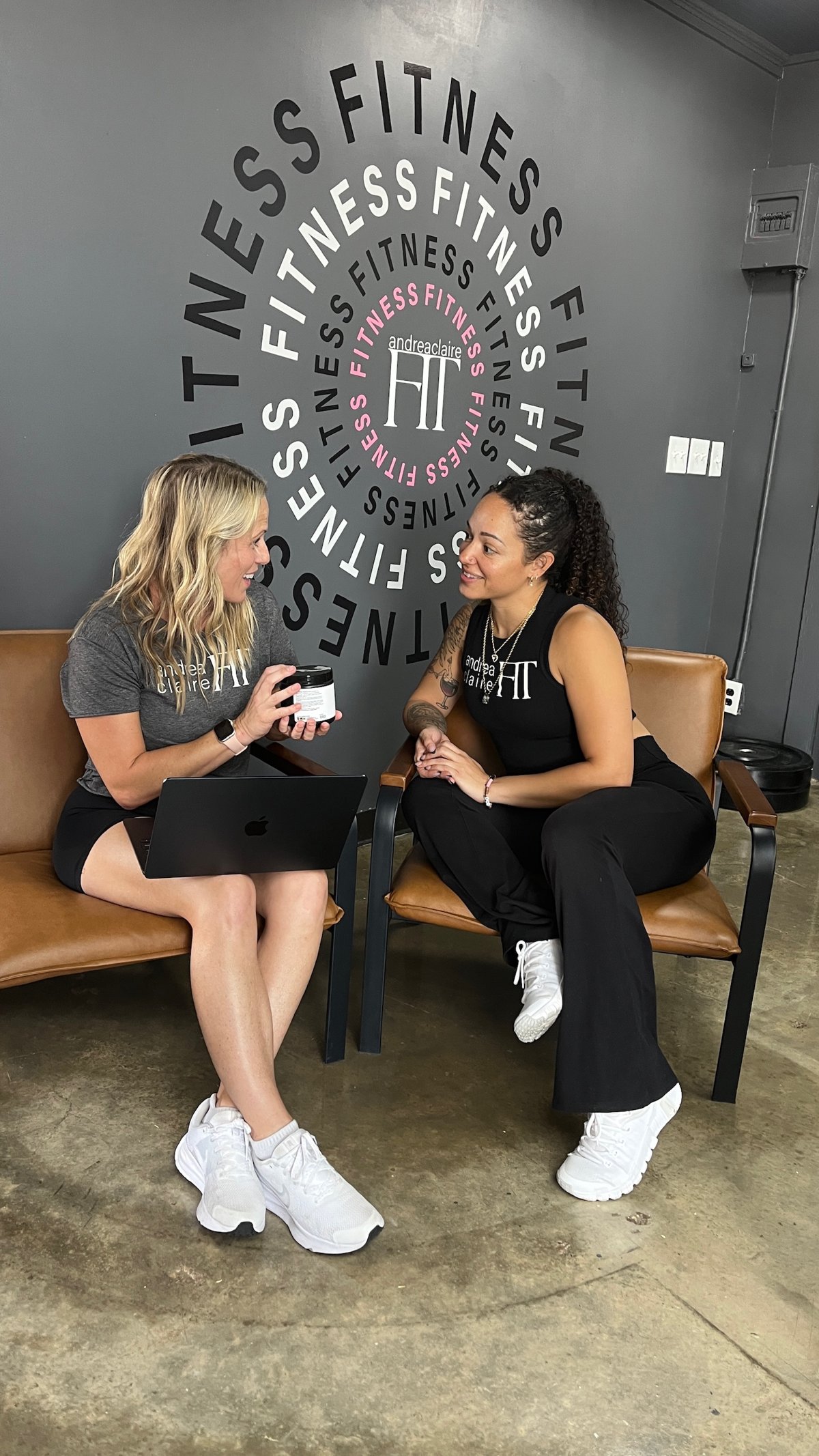 Andrea Mayard listening to a client in her studio