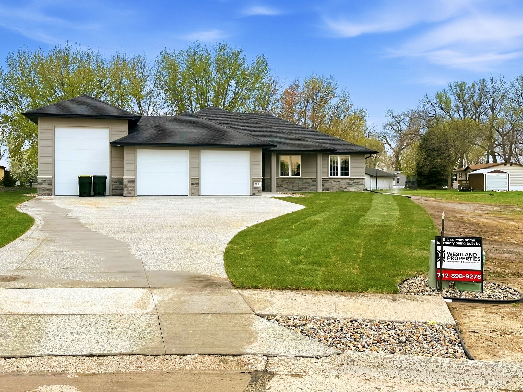 Finished custom home with two car garage and driveway in Sioux City, IA