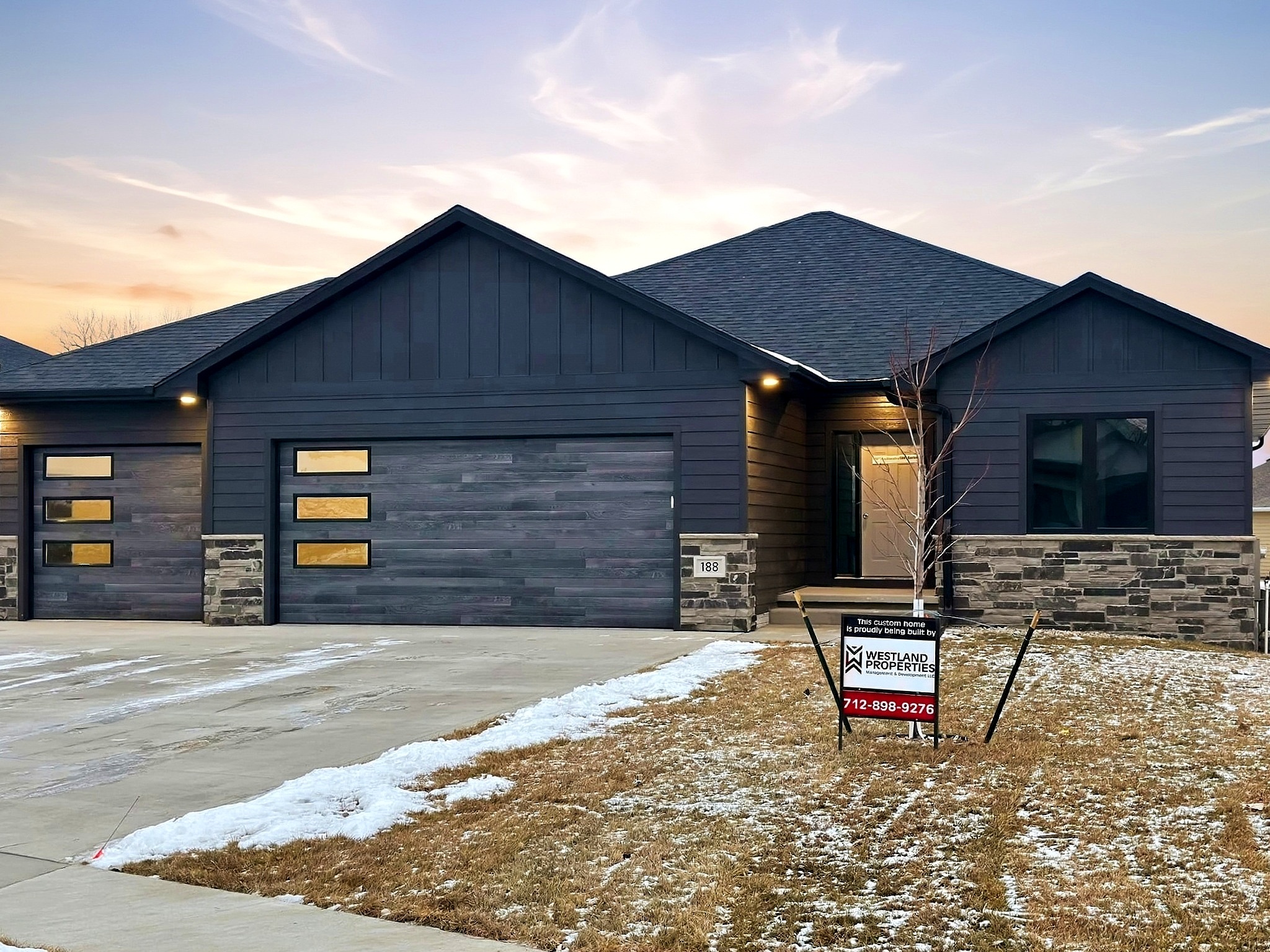 Finished two story custom home with stone front on Hinrich Court in Sioux City, IA