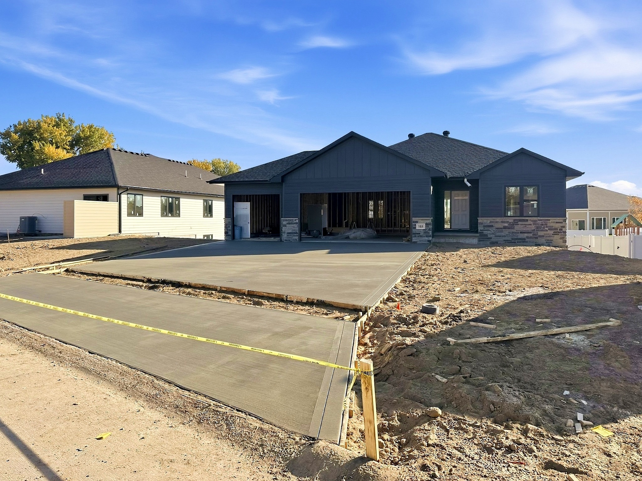 Finished custom home with garage and driveway in Sioux City, IA