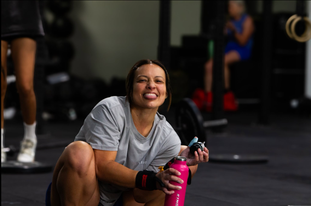 Member smiling between sets