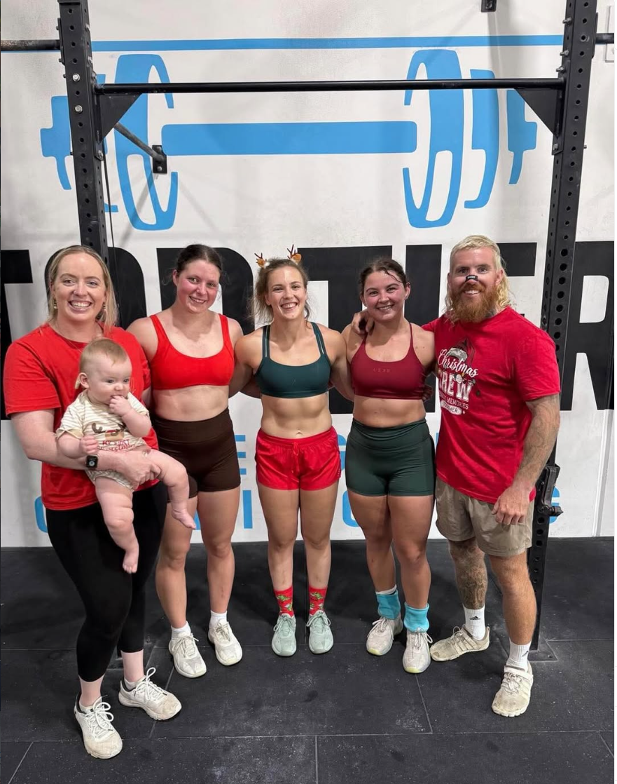 Members and family at Top Tier