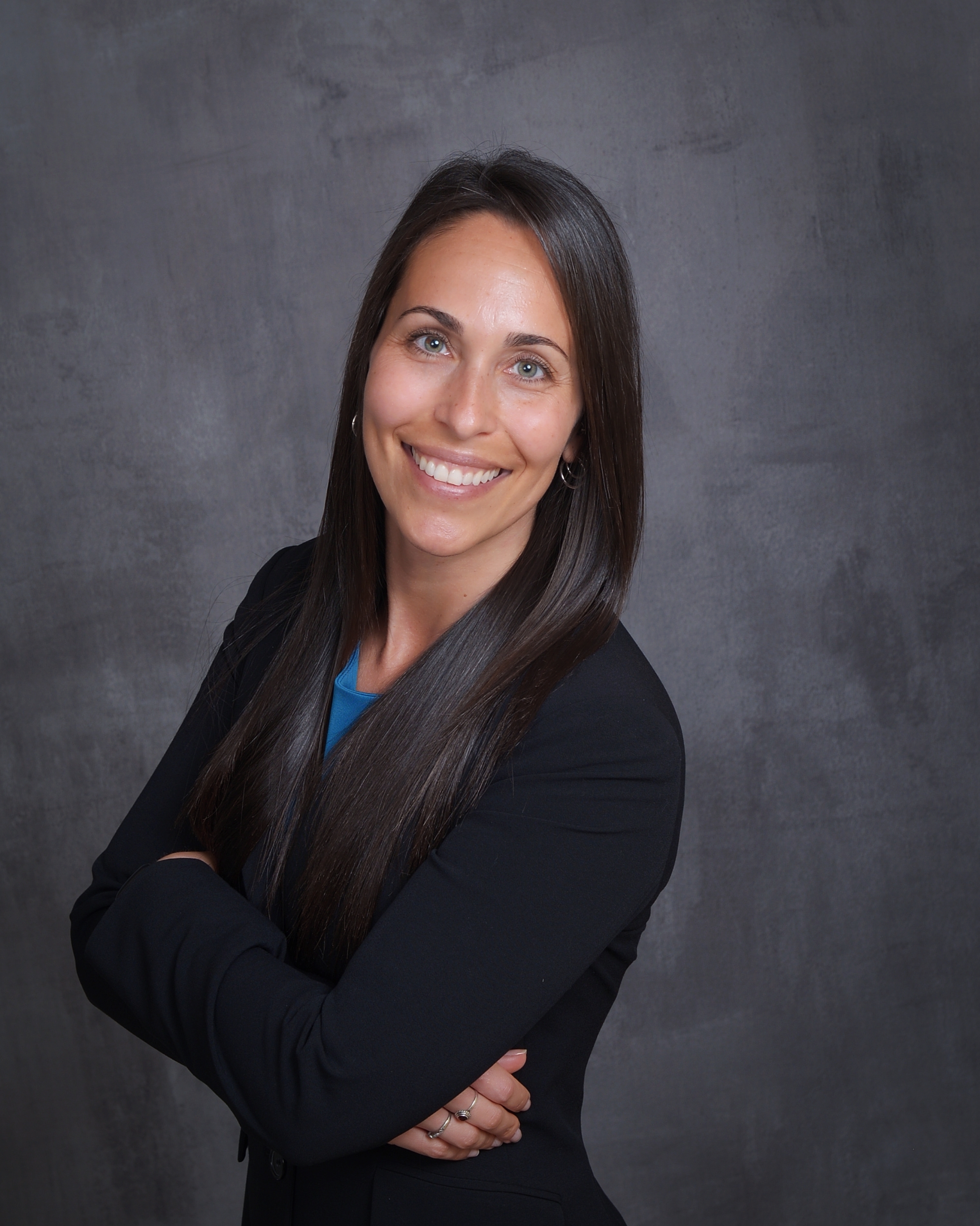 Sammi, co-founder of Ironclad Wealth Partners, in a professional headshot