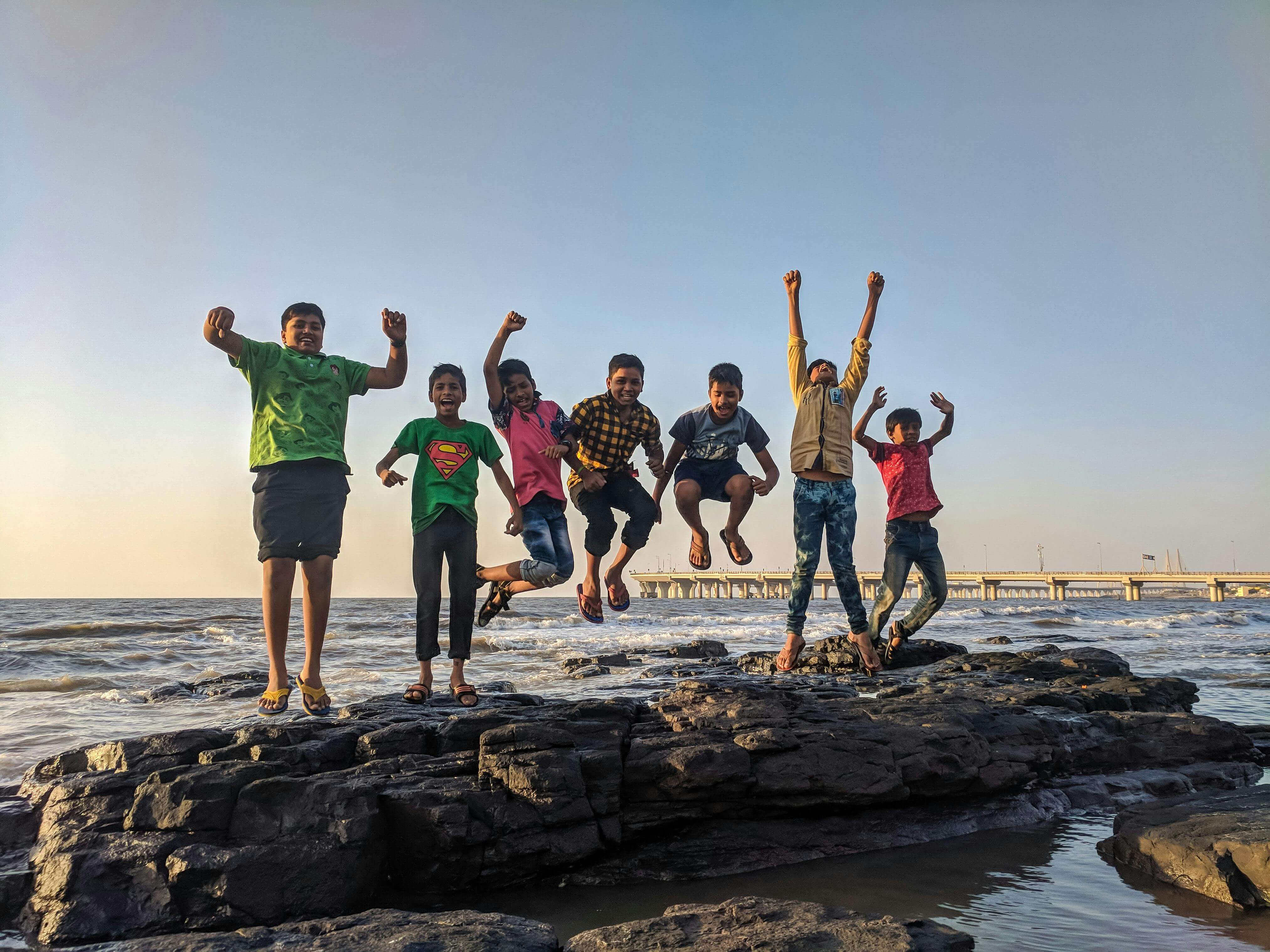 Happy kids playing at the beach