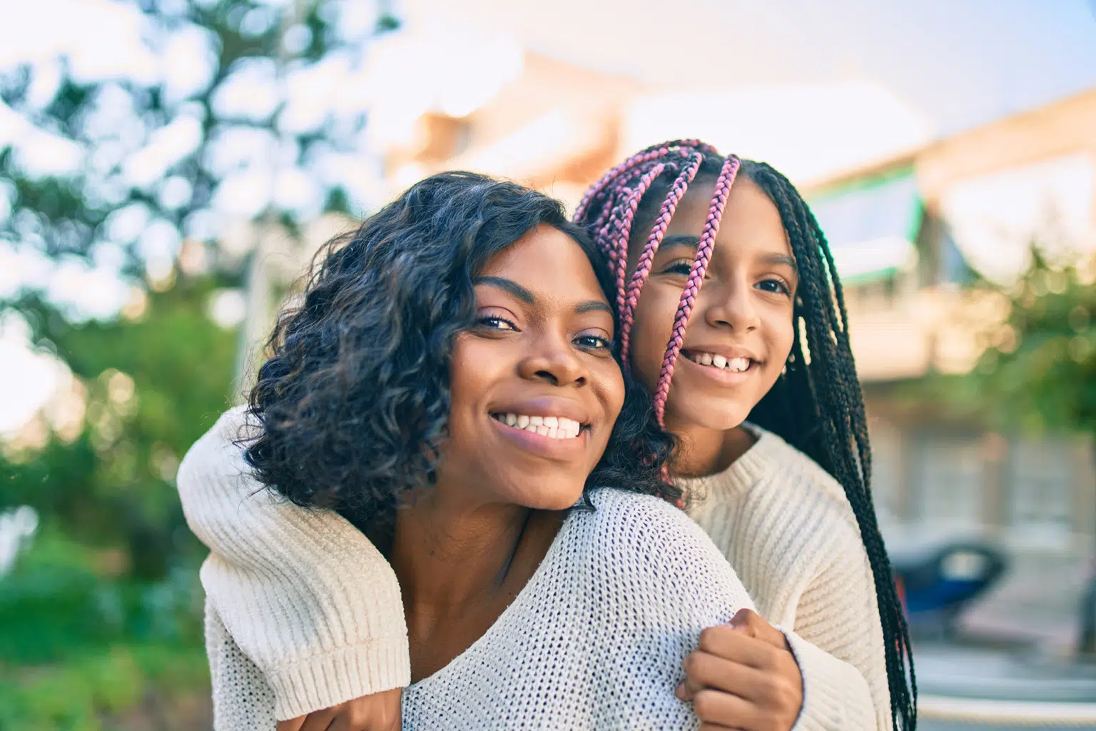 Mother and daughter smiling at All Smiles Munster