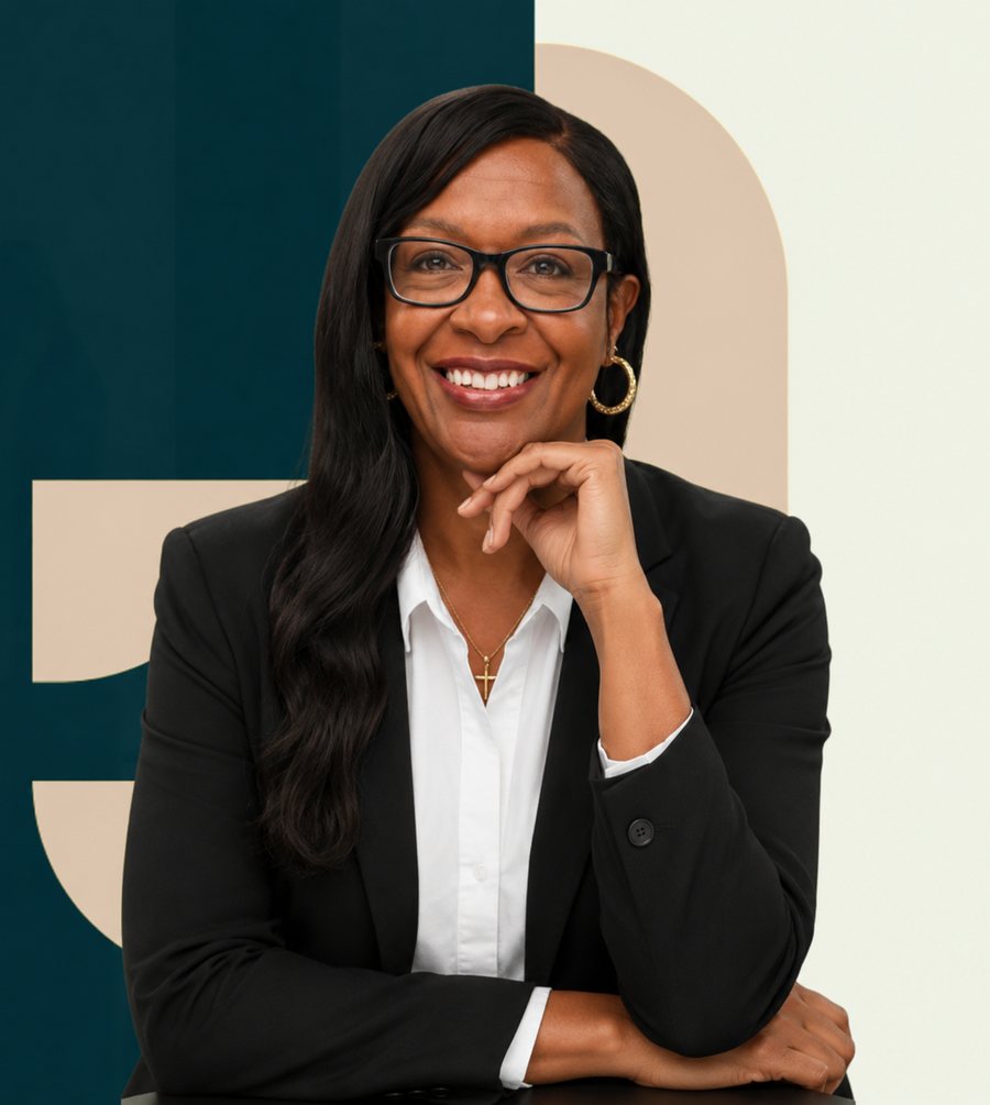 Jae Brown, founder of Clarity Before Commitment, smiling in a black blazer