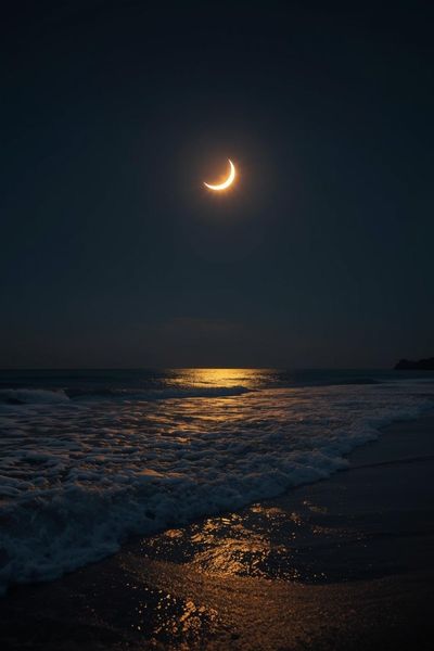 Serene night ocean tides under a golden crescent moon representing the restorative flow of a rest-ready business empire. Serene night ocean tides under a golden crescent moon representing the restorative flow of a rest-ready business empire.