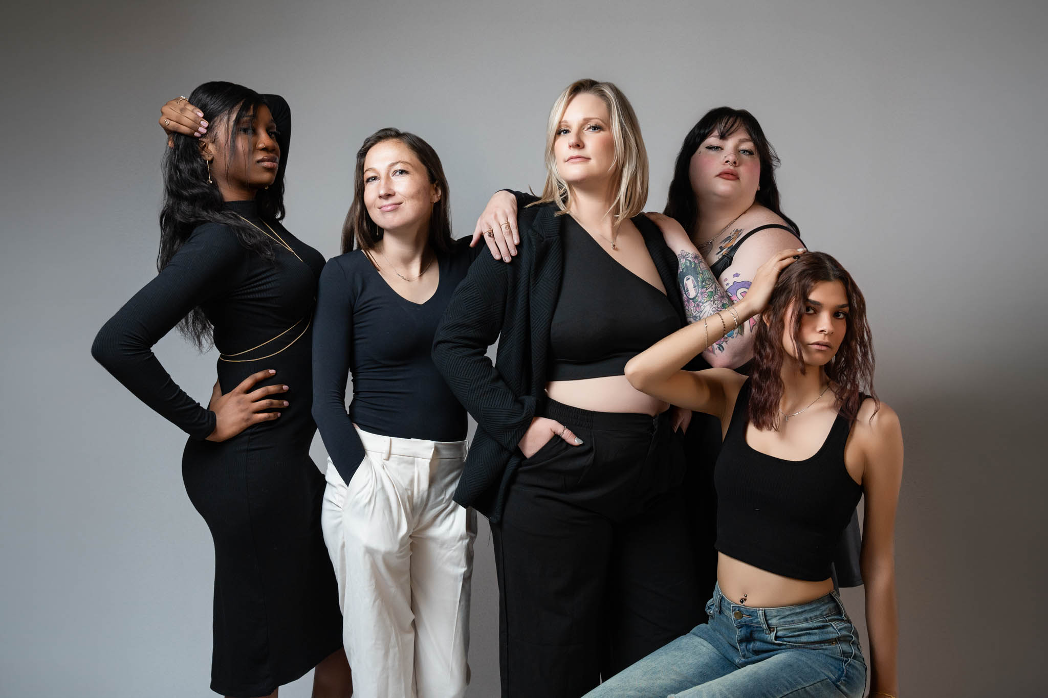 Fashion image of women showcasing permanent jewelry collection