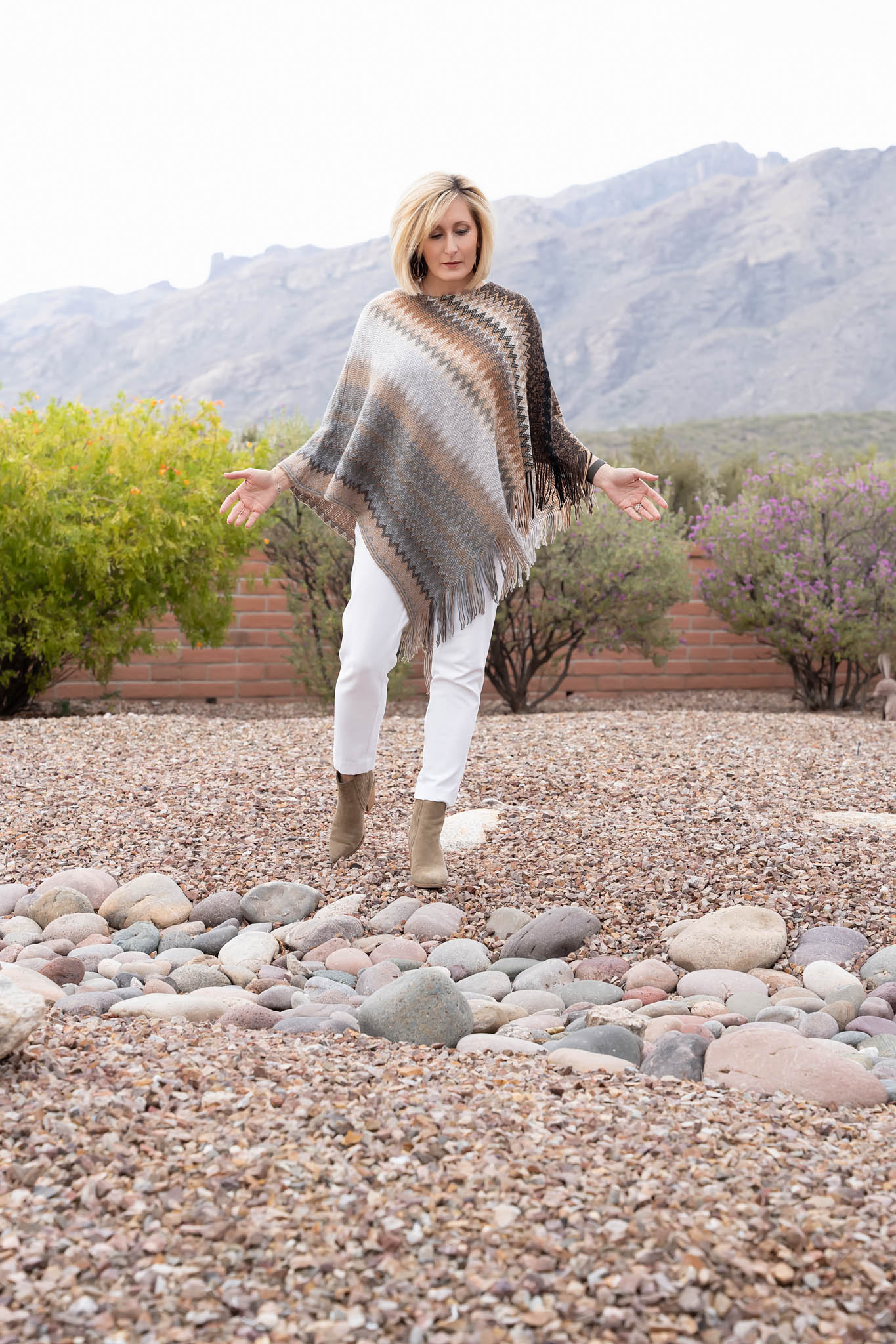 Full body outdoor branding photo of woman in desert landscape with Tucson mountains | Jessica Korff Studios Tucson, AZ
