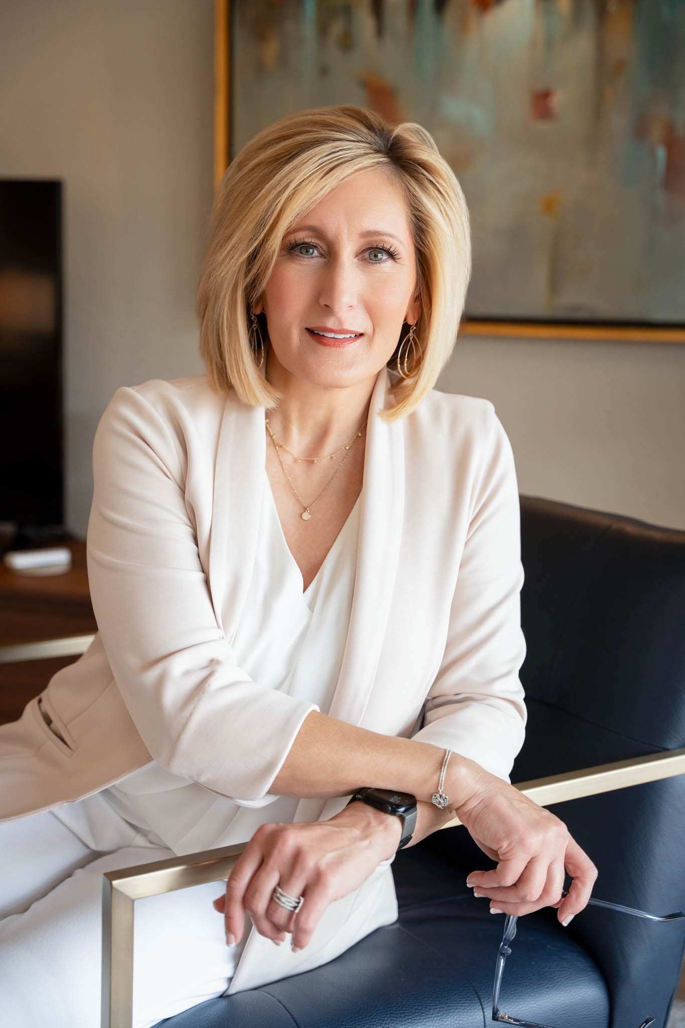 Close-up branding portrait of woman in neutral blazer, elegant and polished professional look | Jessica Korff Studios Tucson, AZ