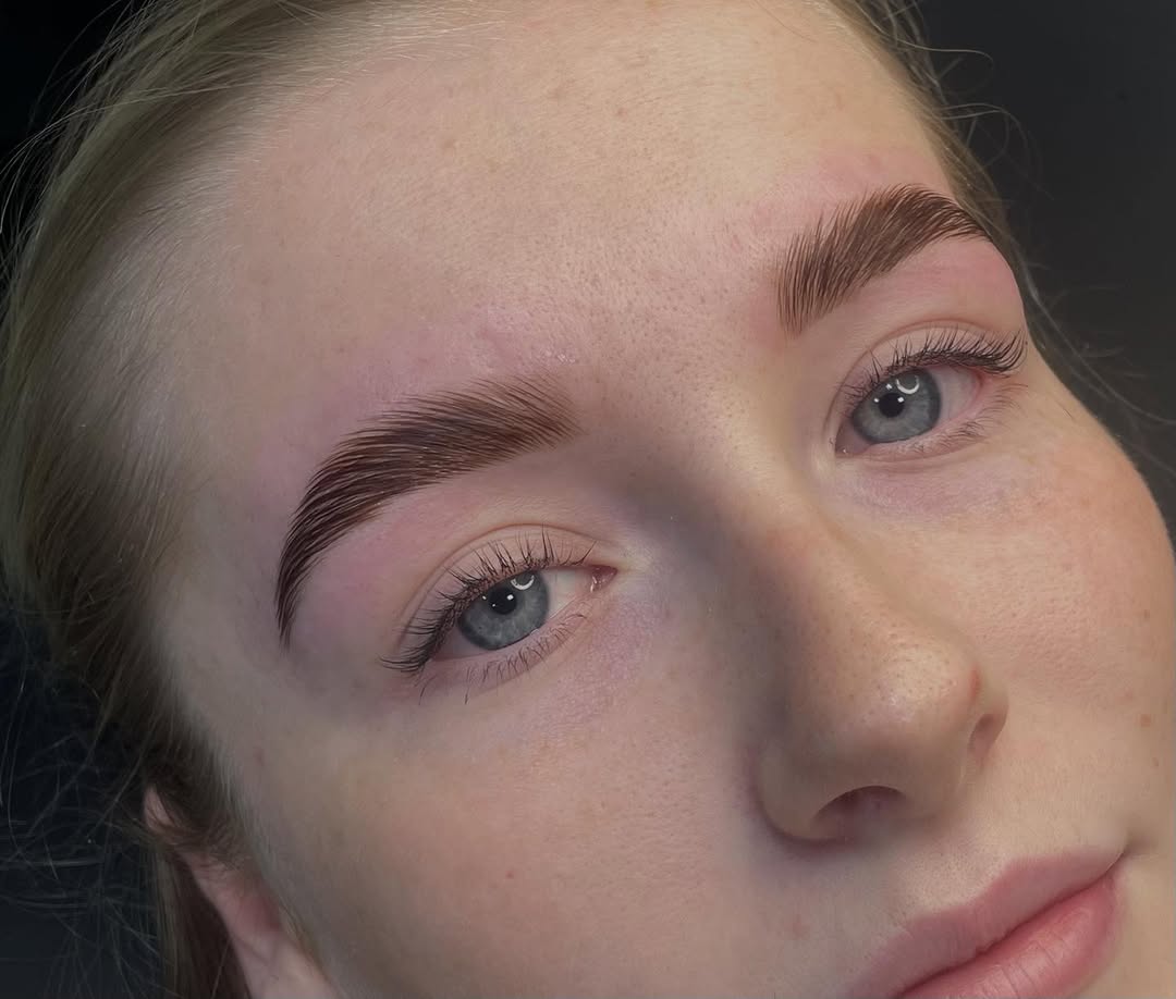 Brow lamination — lifted and set with architectural care.
