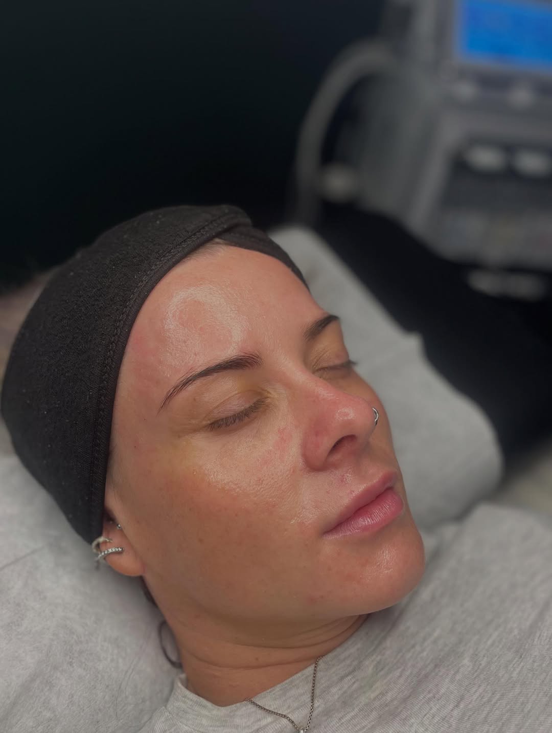 A professional facial in progress — quiet, unhurried, and precise.