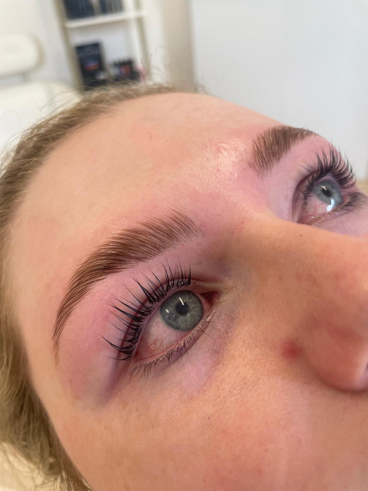 Brow lamination — hairs set and lifted with precision.
