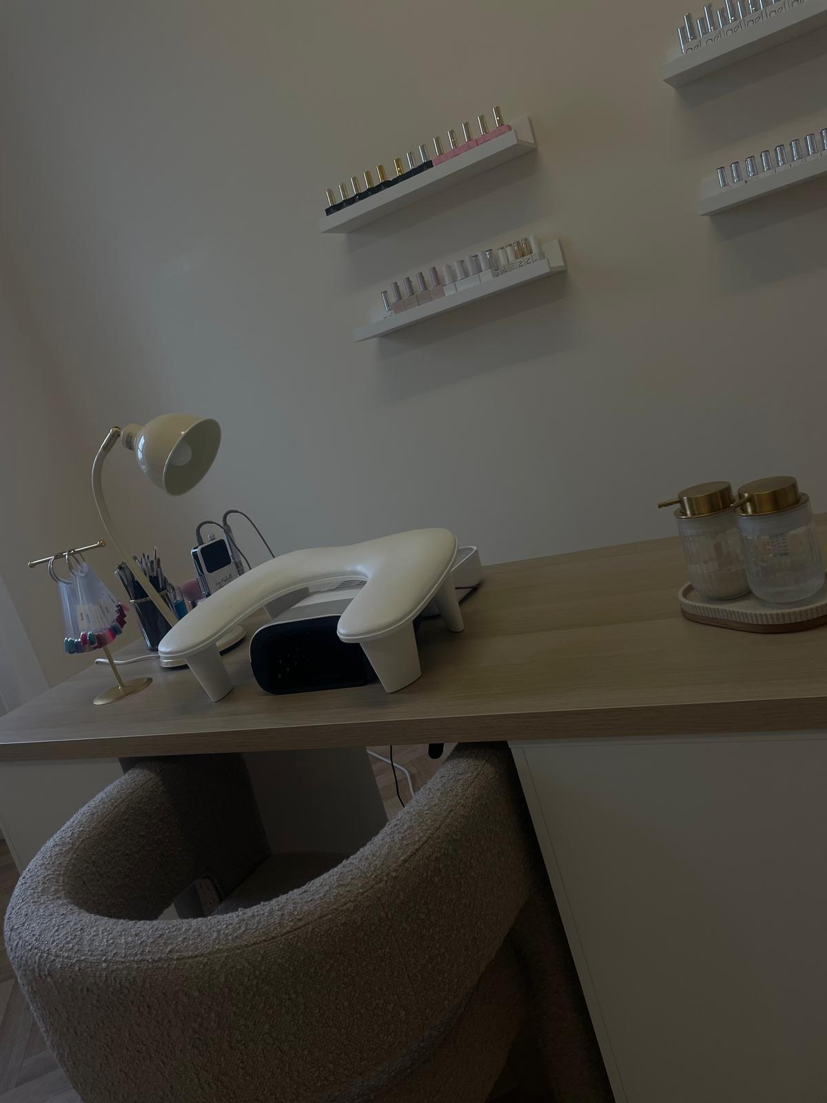 Molls Studio treatment room — prepared, private, and quietly lit.