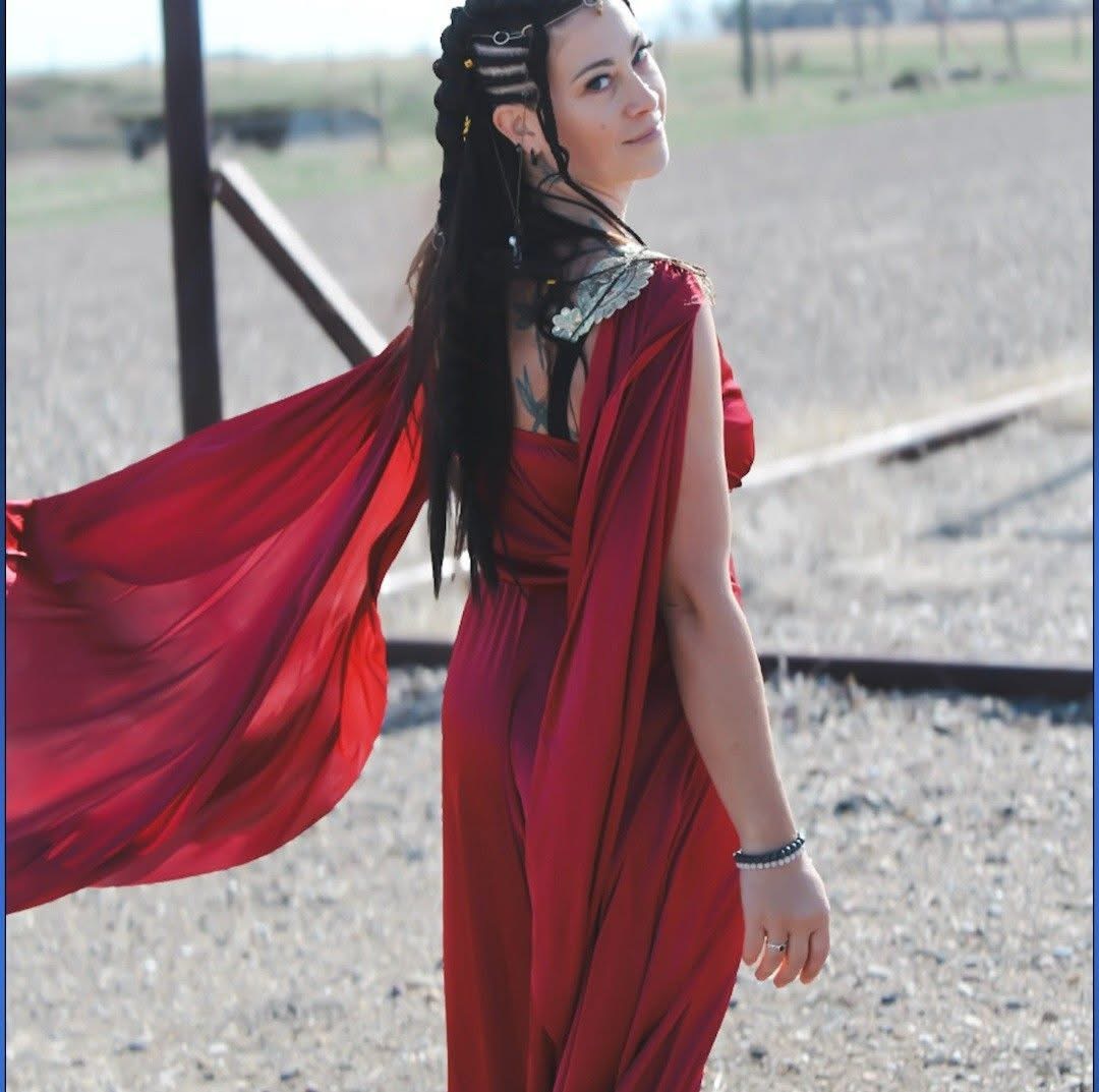 Woman connecting with her inner goddess in a serene setting