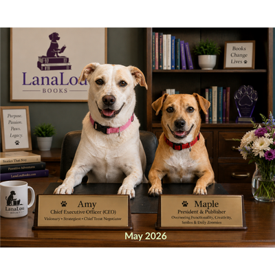 Amy & Maple at their desk with their name plates