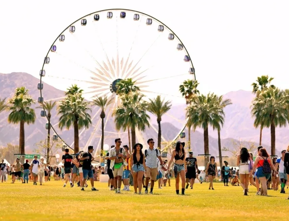 Festival goers at the Coachella Valley Music Festival ferris wheel, serviced by Party Bus Palm Springs shuttle