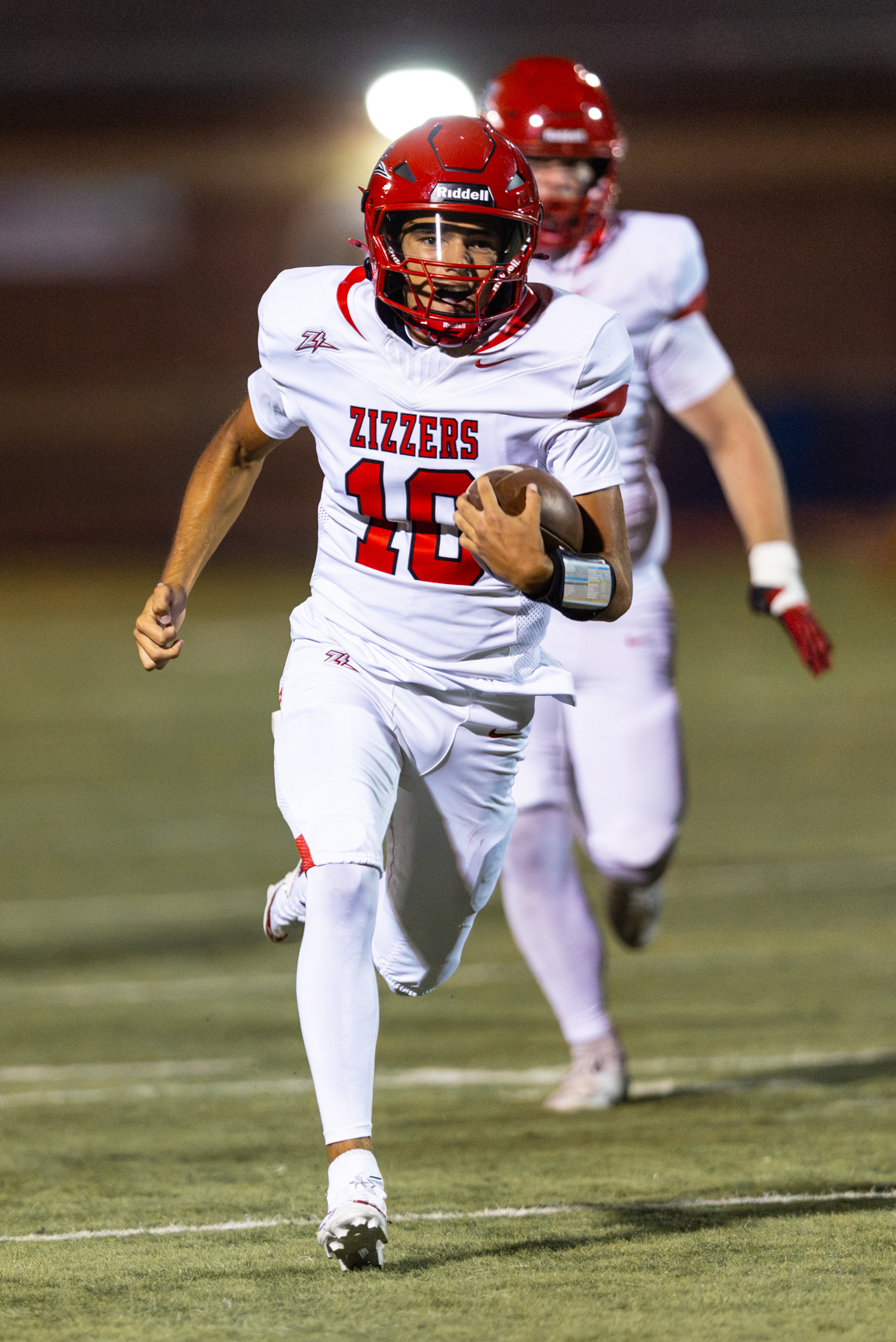Professional dedicated athlete football photography