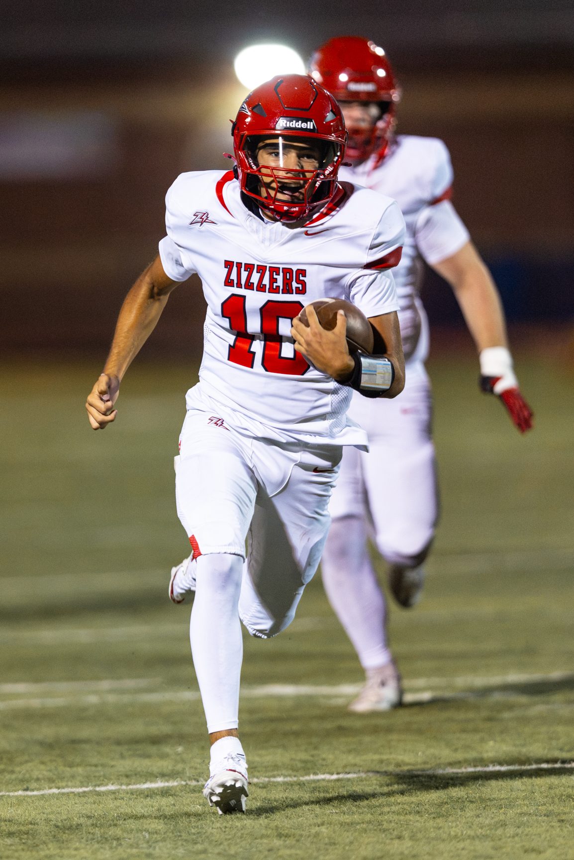 Professional dedicated athlete football photography