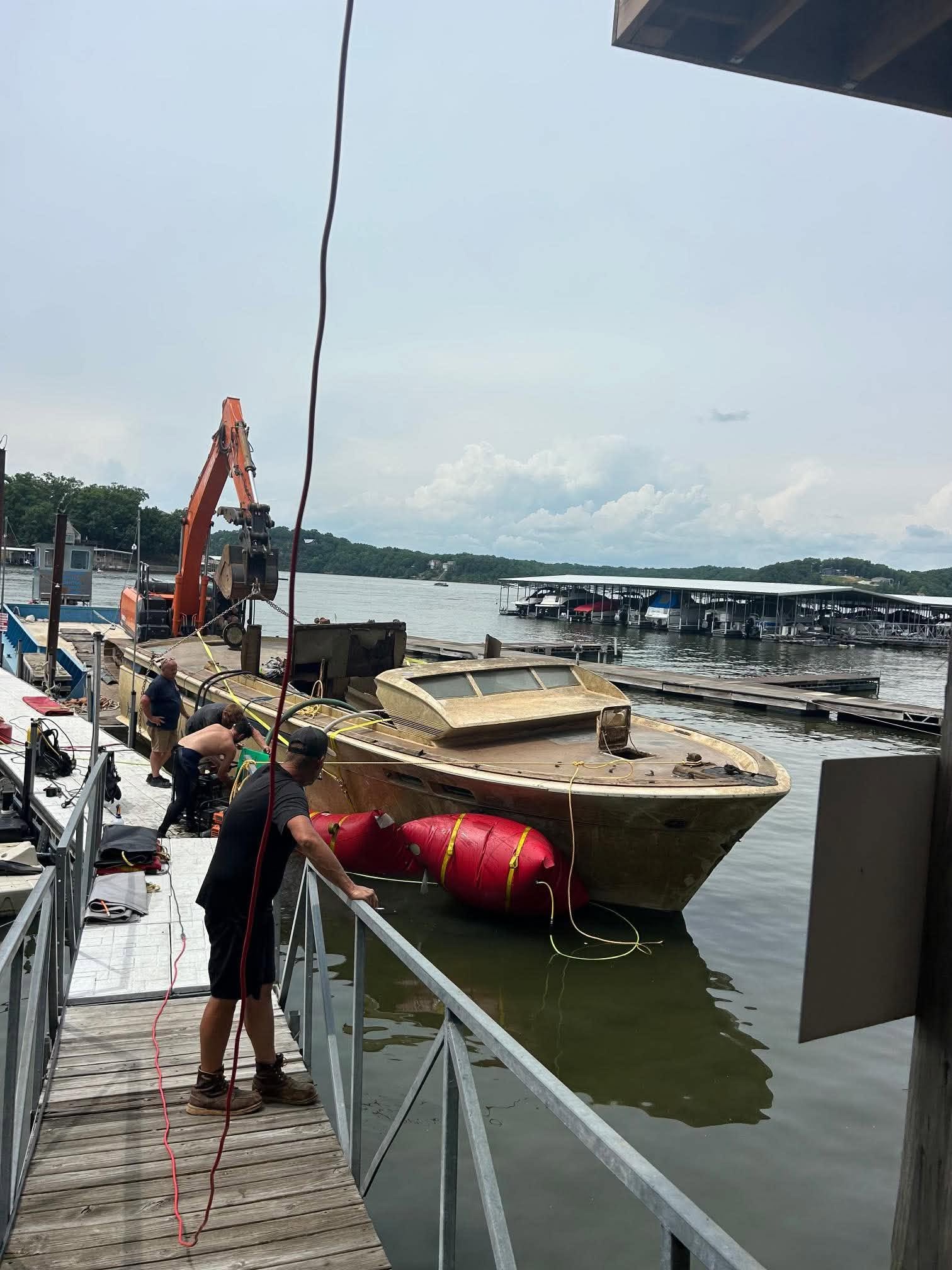 Same boat after being raised by LOZ Dive