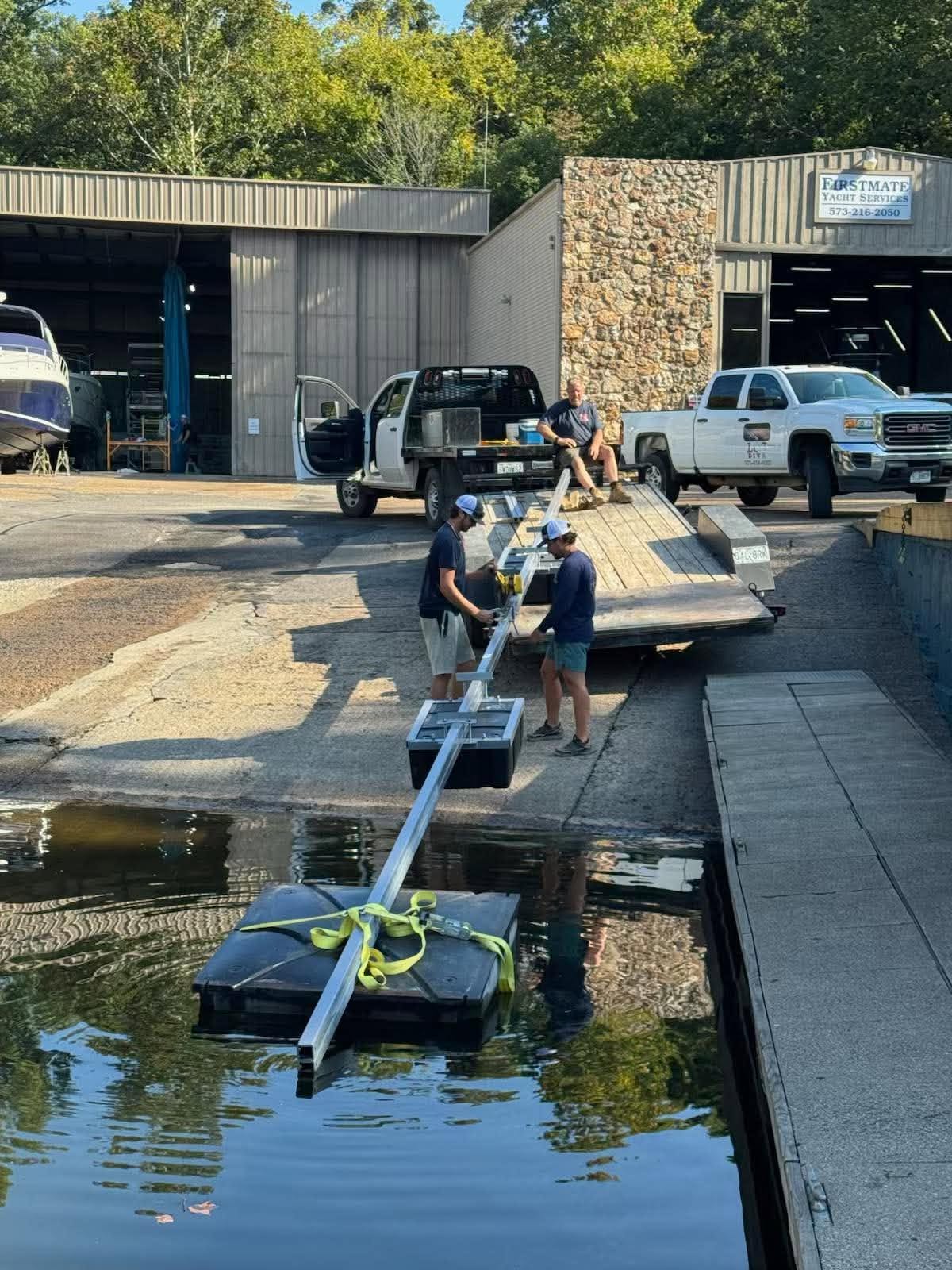 LOZ Dive diver entering the water next to a dock at Lake of the Ozarks