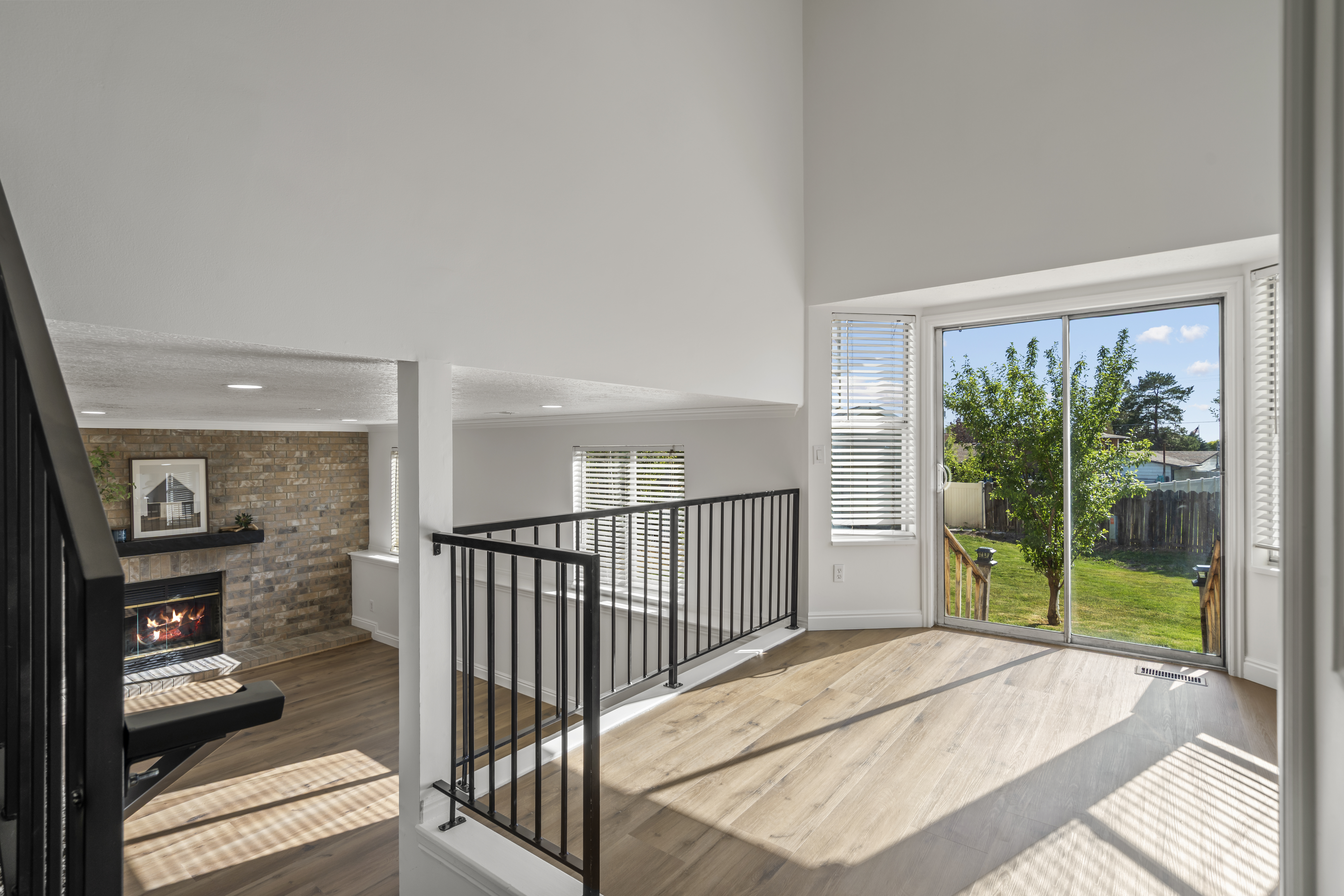 Upstairs landing with railing overlooking the living room below