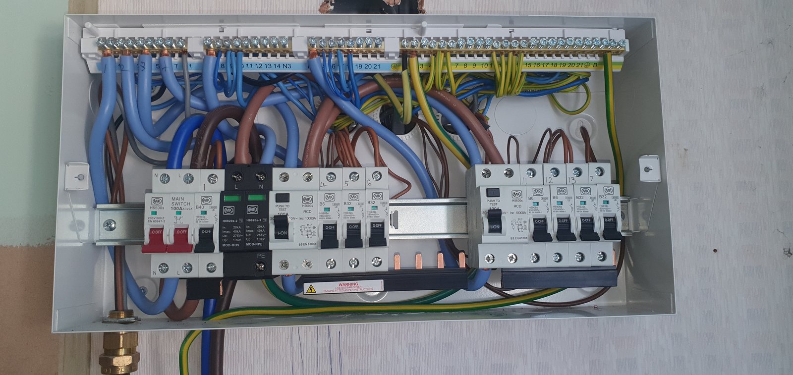 Close up of wiring terminated into a new consumer unit by Cord Electrical