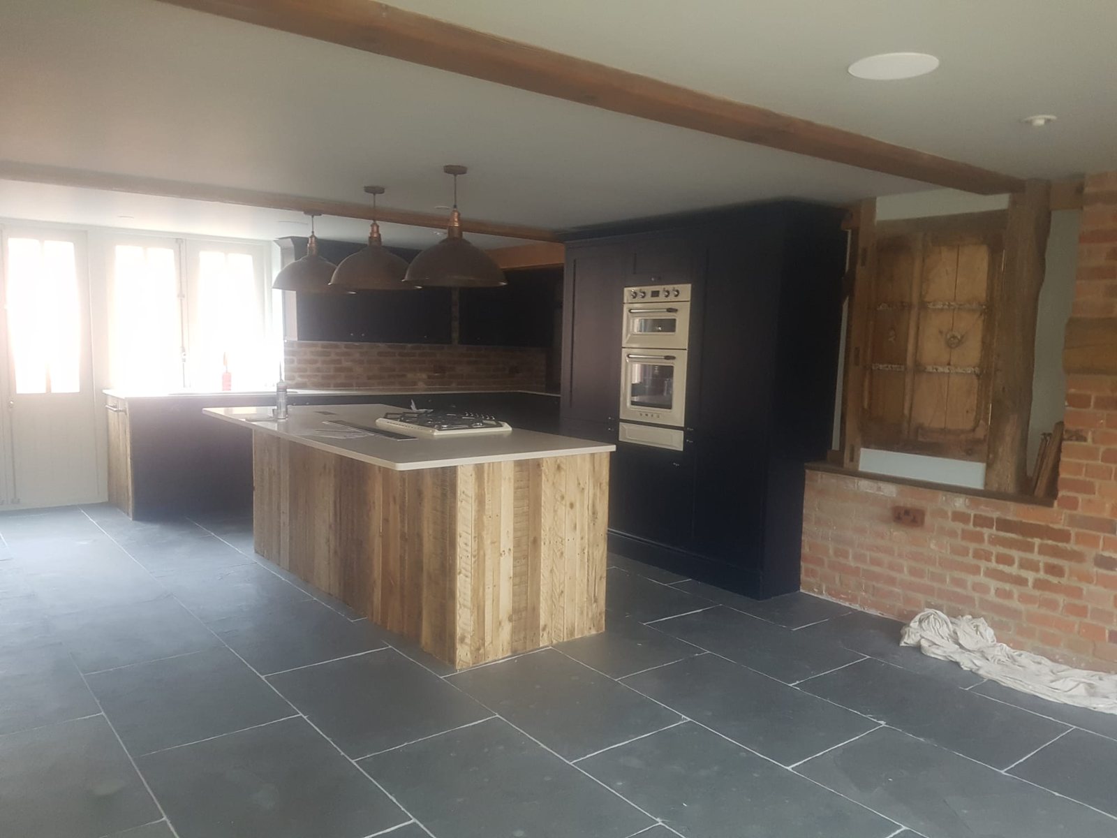 Kitchen island with lighting and power installed