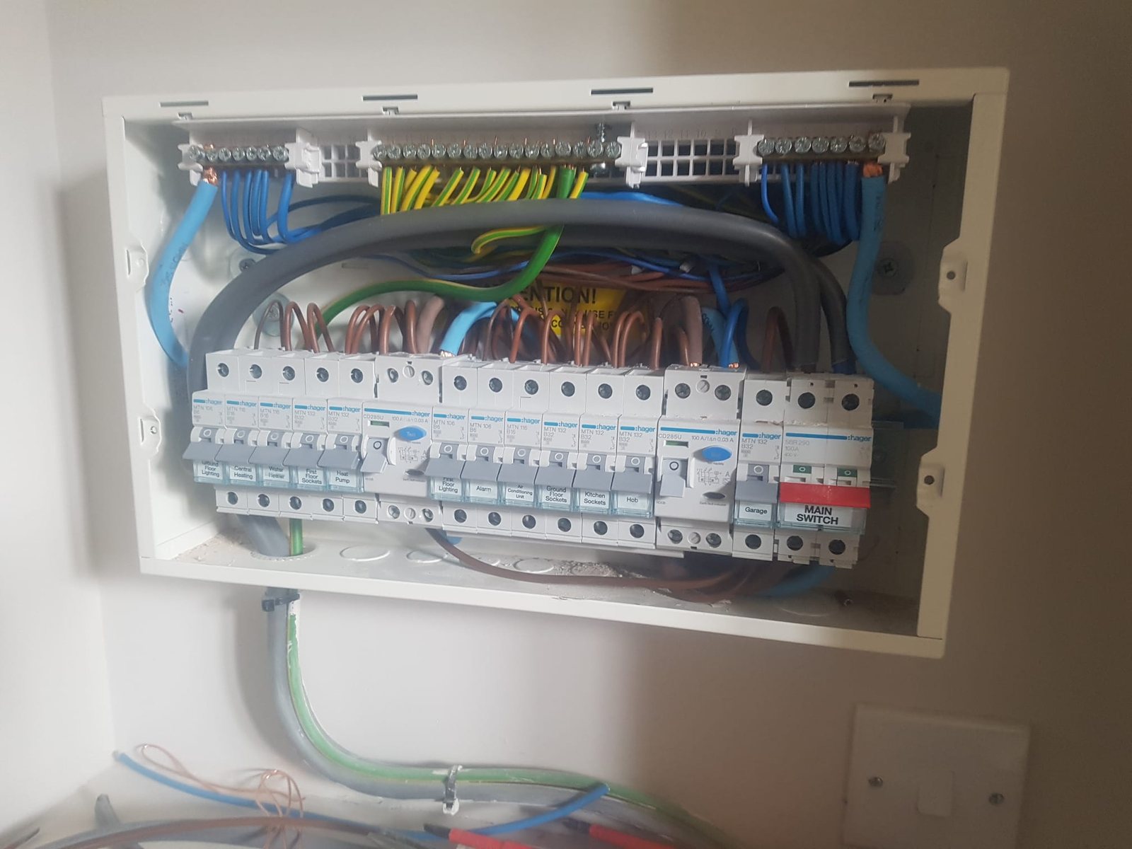 Consumer unit with neatly terminated circuit wiring on a full rewire by Cord Electrical