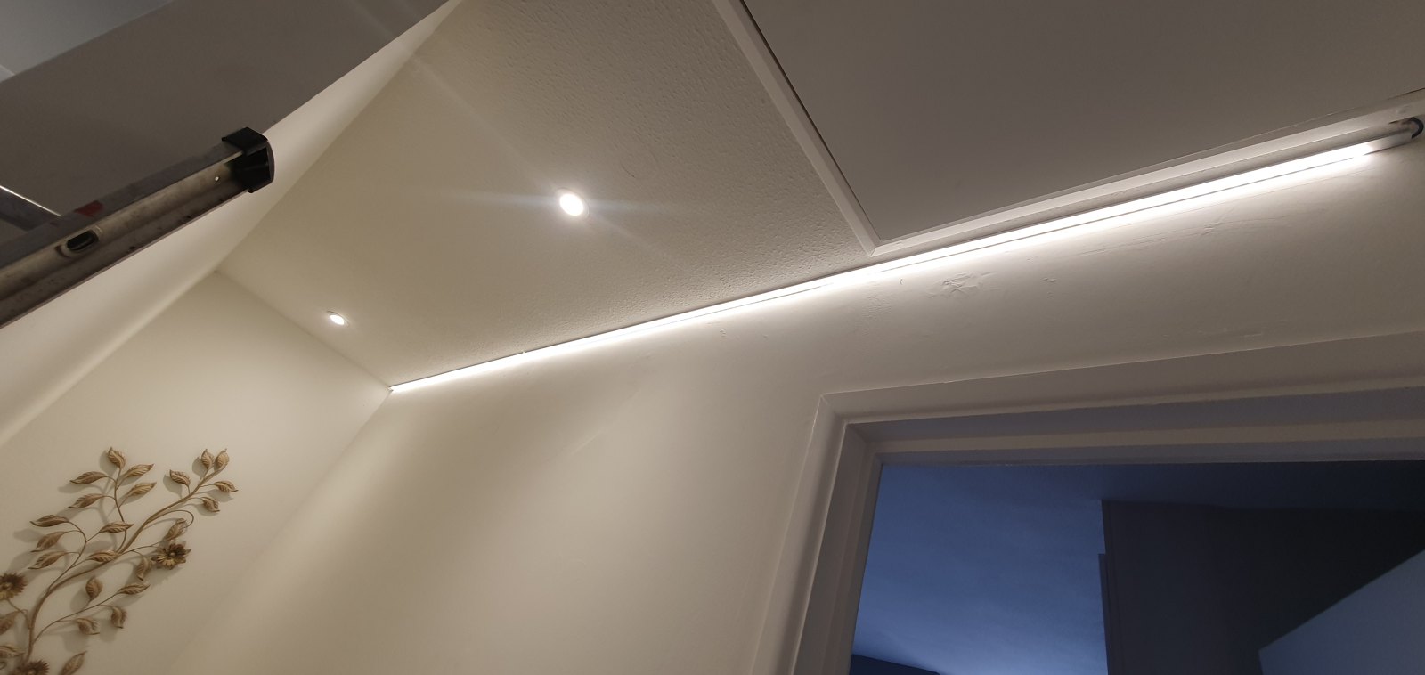 LED strip lighting in a coved ceiling recess