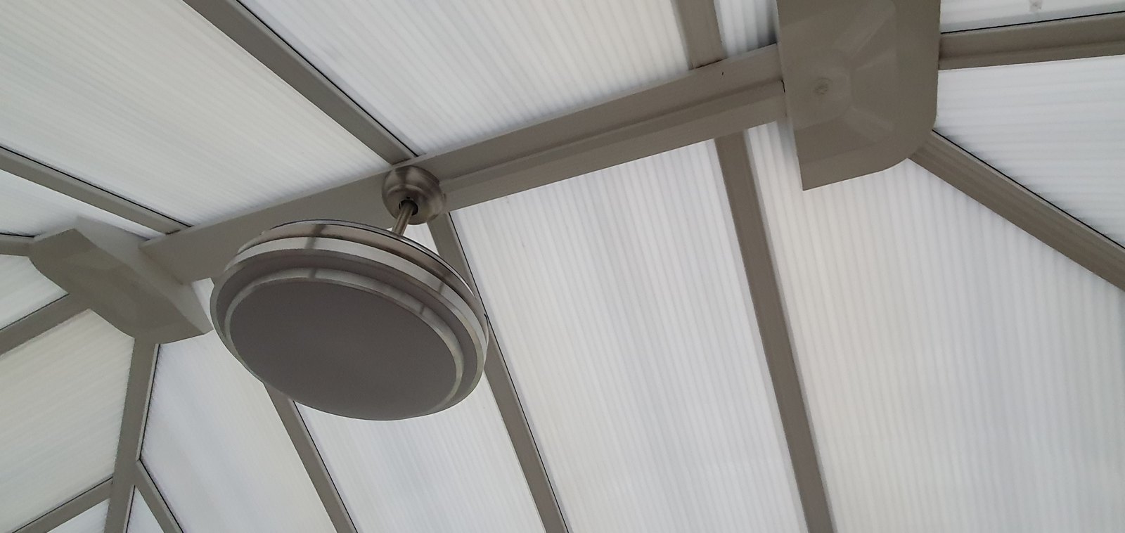 Ceiling fan with light fitted to a conservatory roof