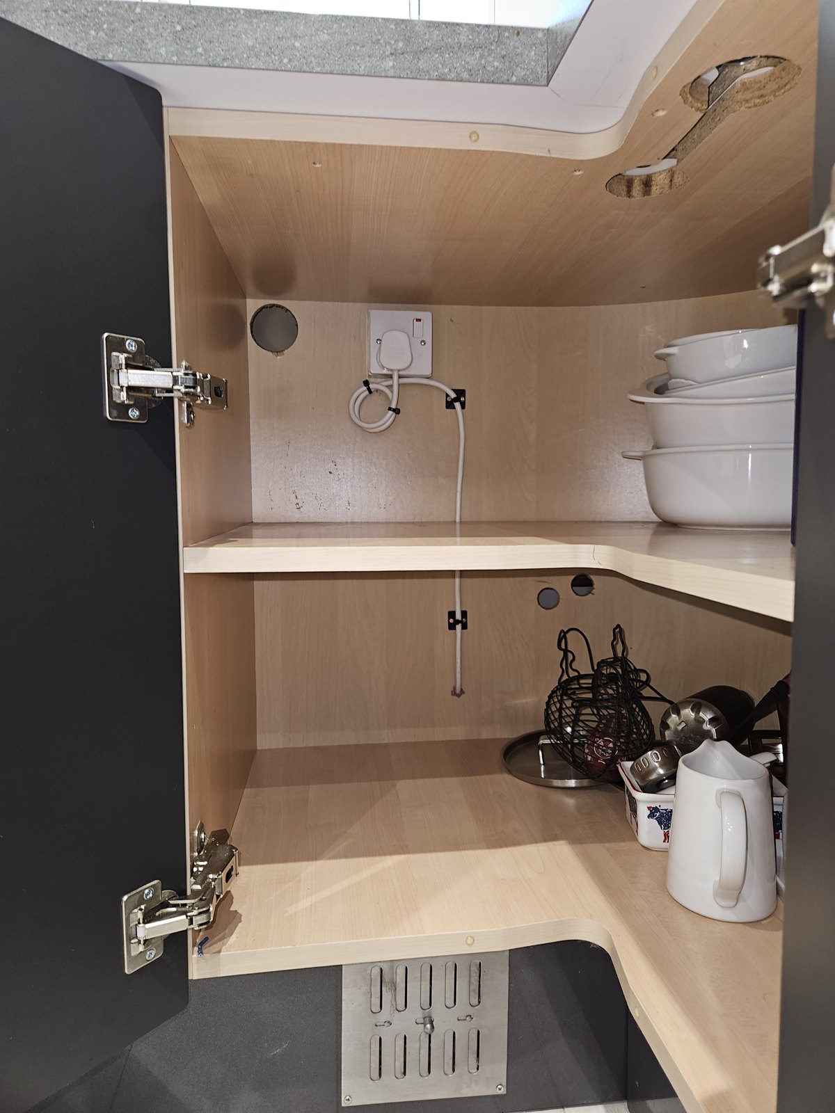 Pantry cupboard with internal lighting and sockets